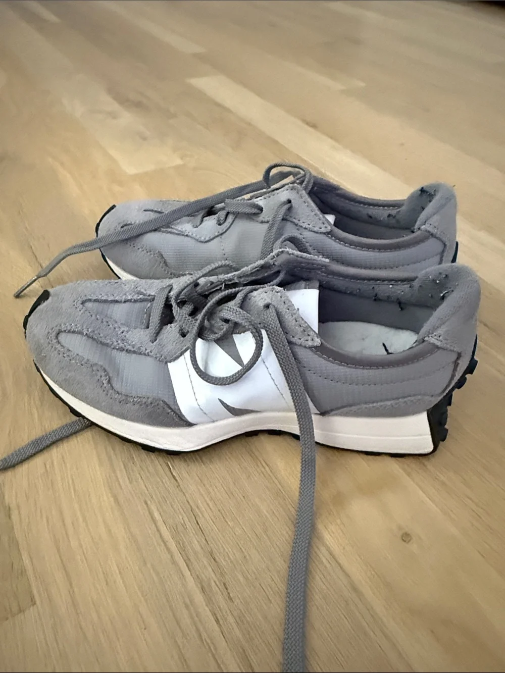 New Balance Kids Gray and White Sneakers